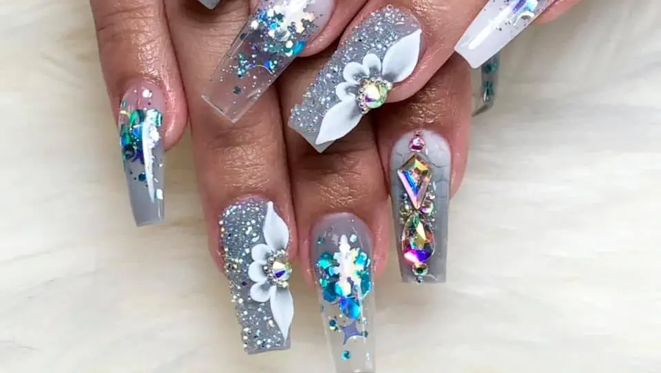 Clear glitter coffin acrylics with white 3D flowers and crystals