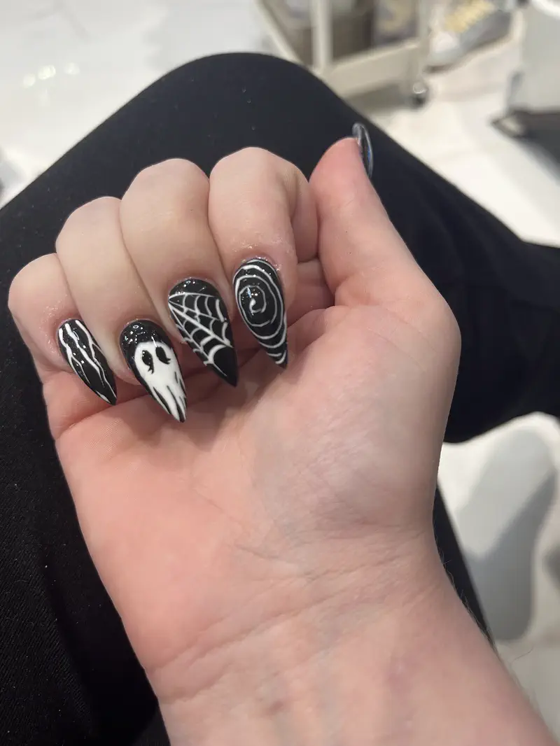 Black and white spiderweb nail art